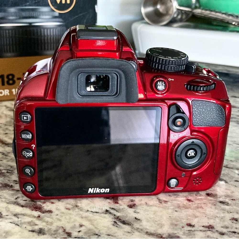 Like New Red Nikon D3100 Digital SLR Camera with 18-55mm NIKKOR VR Lens